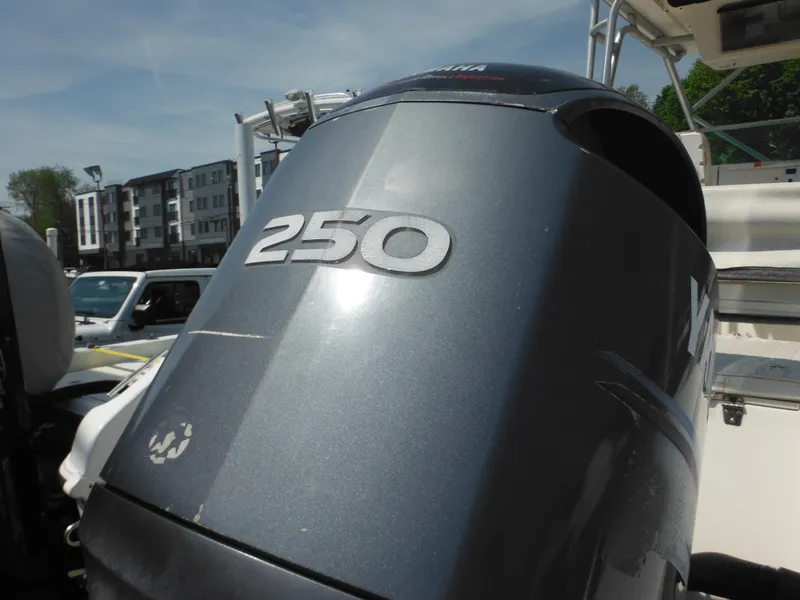 Slide: The Image of Outboard motor on a 2002 Robalo R235 Walkaround boat, featuring a 250 horsepower engine. - 7