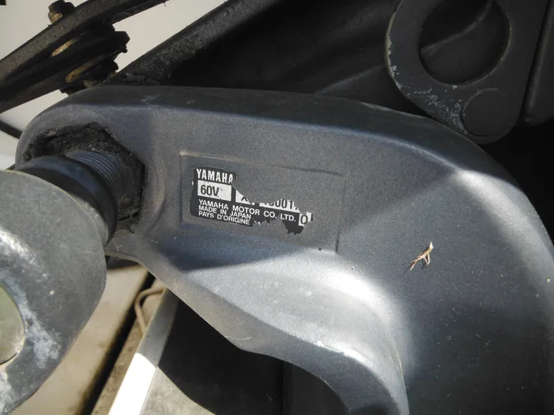 Slide: The Image of Yamaha motor part on 2002 Robalo R235 Walkaround boat, close-up view. - 9