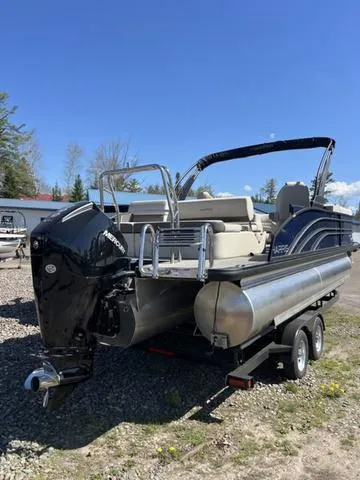 Slide: The Image of 2025 Harris SUNLINER 230 SLDH pontoon boat on trailer, sunny day, outdoor setting. - 3