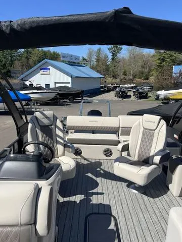 Slide: The Image of 2025 Harris SUNLINER 230 SLDH pontoon boat with luxurious seating and modern design. - 6