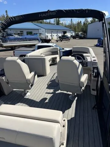 Slide: The Image of 2025 Harris SUNLINER 230 SLDH pontoon boat with spacious seating and modern design. - 7