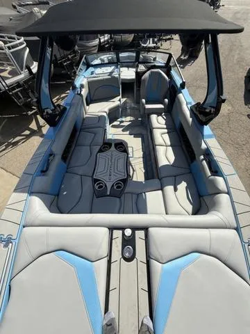 Slide: The Image of 2025 Centurion Fe25 boat interior with spacious seating and modern design. - 13