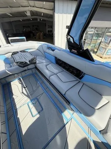 Slide: The Image of 2025 Centurion Fe25 boat interior with sleek seating and modern design. - 5
