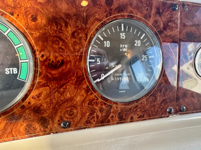 Slide: The Image of Dashboard of 1999 Bayliner 5288 Pilot House Motoryacht with RPM gauge. - 17