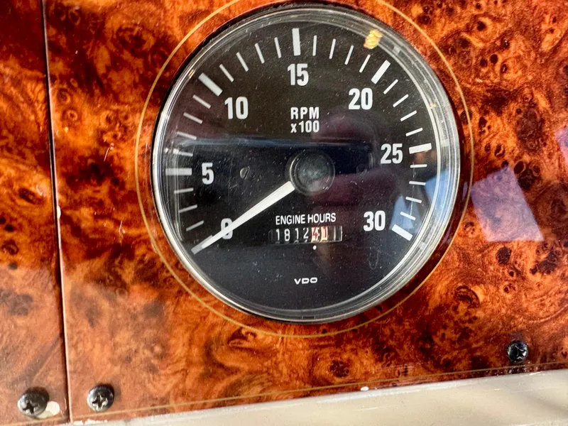 Slide: The Image of Tachometer of 1999 Bayliner 5288 Pilot House Motoryacht showing RPM and engine hours. - 18