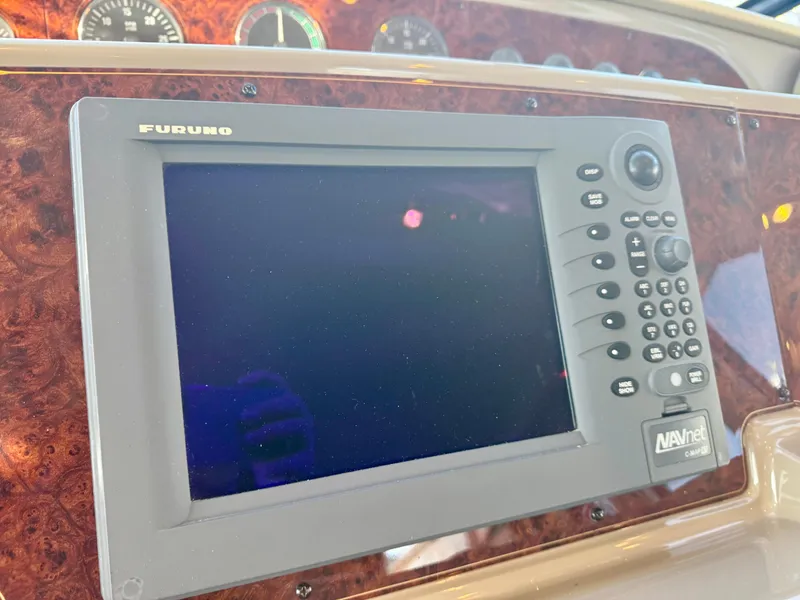 Slide: The Image of Furuno navigation system on 1999 Bayliner 5288 Pilot House Motoryacht dashboard. - 23