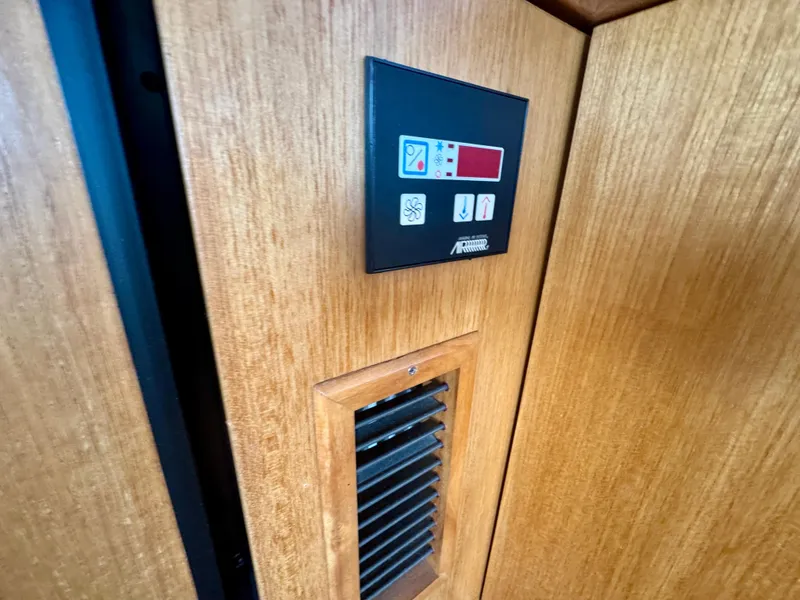Slide: The Image of Control panel and vent on 1999 Bayliner 5288 Pilot House Motoryacht interior. - 25