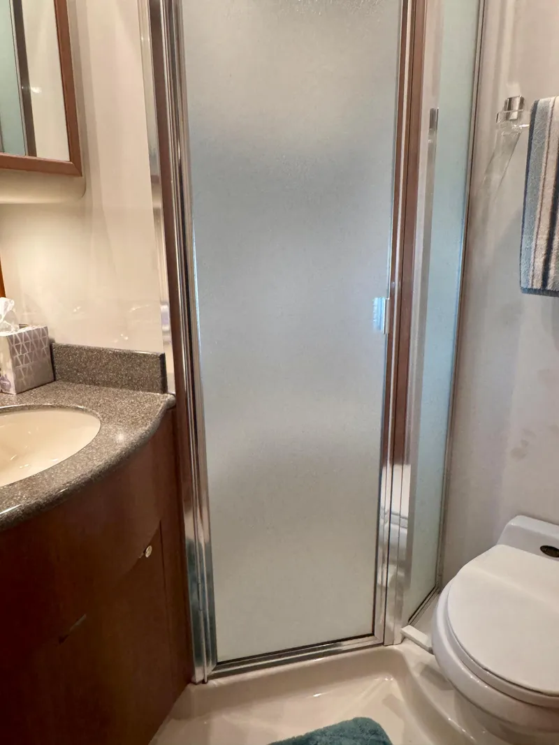 Slide: The Image of Bathroom interior of 1999 Bayliner 5288 Pilot House Motoryacht with shower and toilet. - 38