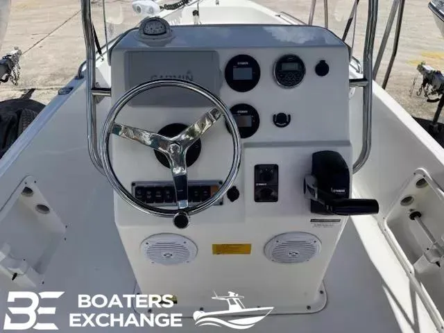 Slide: The Image of 2017 Key West 1720 boat console with steering wheel and controls, Boaters Exchange logo visible. - 7