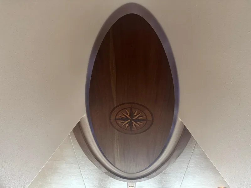 Slide: The Image of Wooden oval ceiling with compass design on 2010 American Tug 49 Limited. - 30