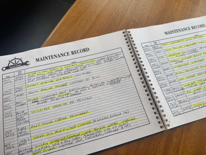 Slide: The Image of Maintenance record book for 2010 American Tug 49 Limited, highlighting service entries. - 49