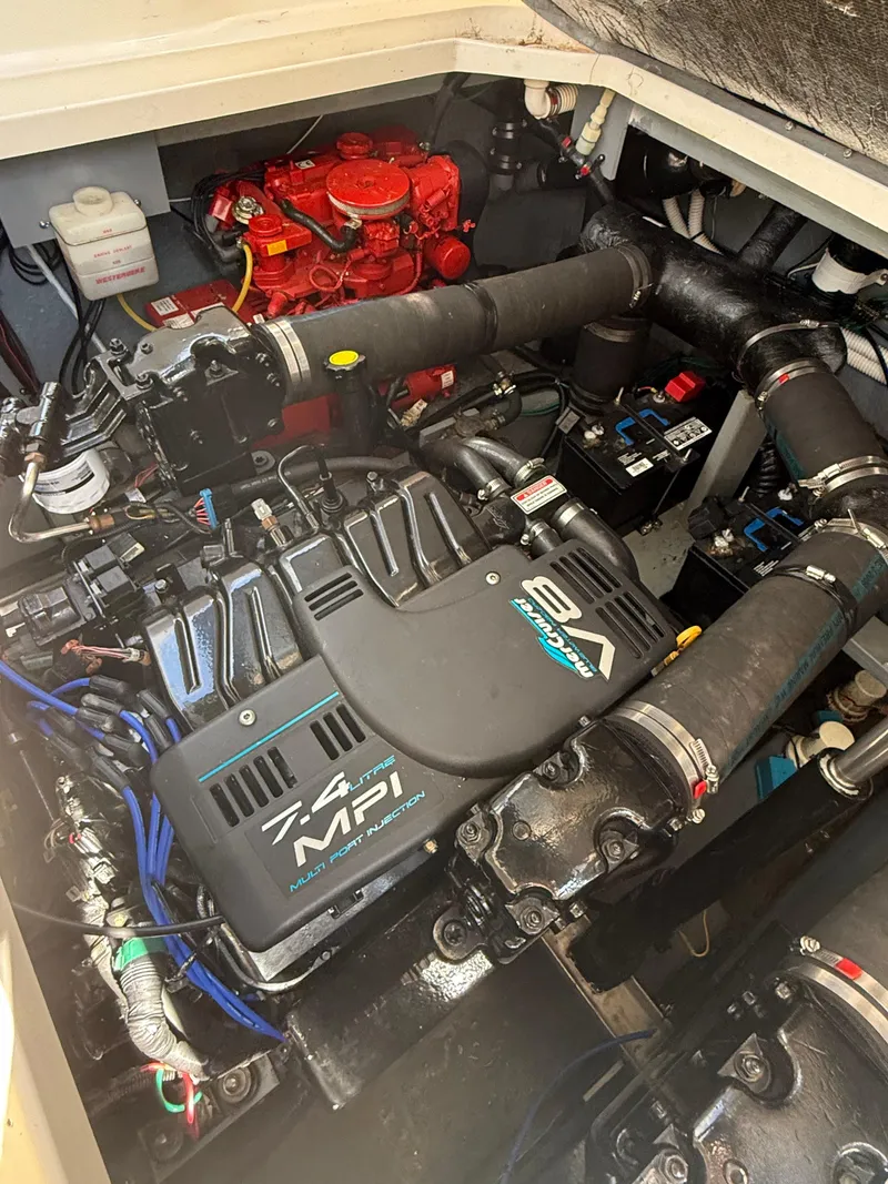 Slide: The Image of Engine compartment of a 1999 Sea Ray 340 Sundancer with 7.4 MPI engine. - 33