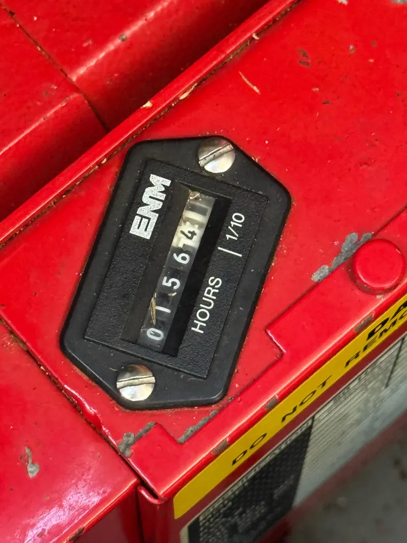 Slide: The Image of Hour meter on a 1999 Sea Ray 340 Sundancer, showing 1564.1 hours. - 35