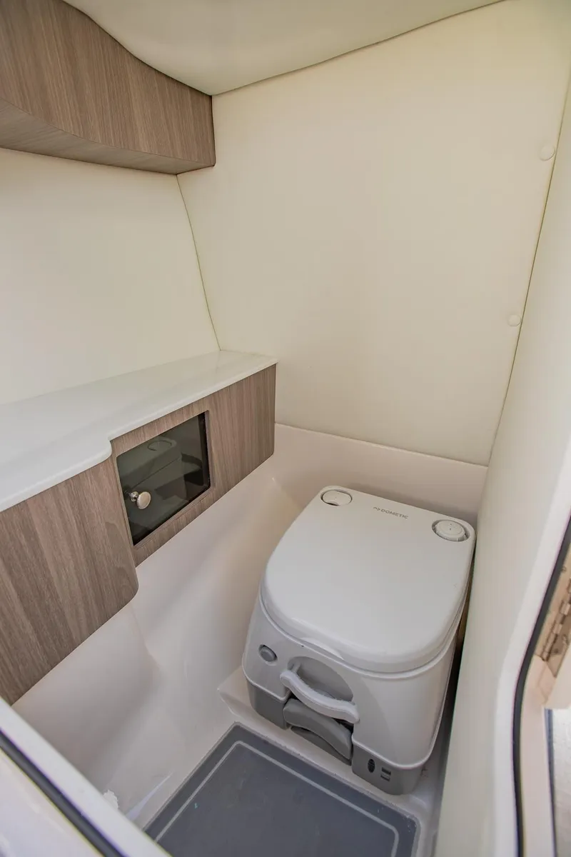 Slide: The Image of Port Side head with Pumpout Fitting - 19