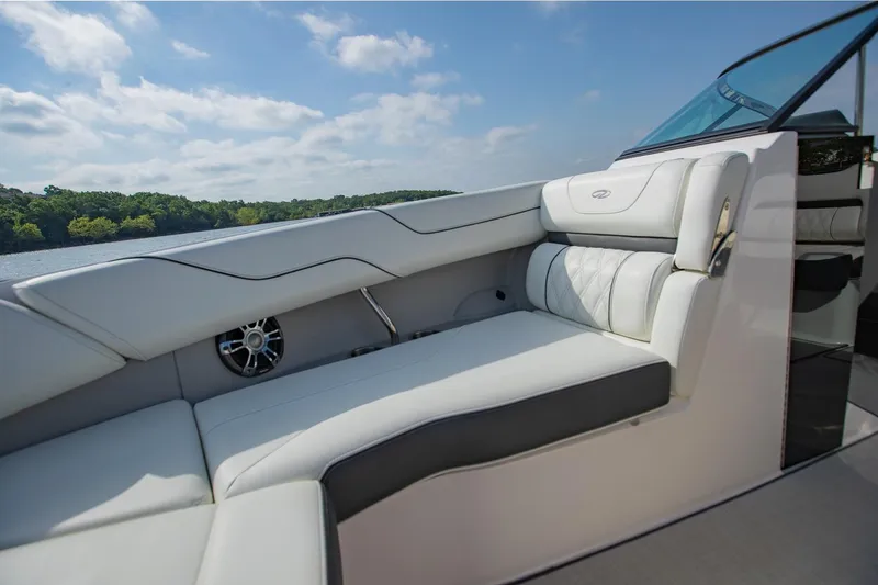 Slide: The Image of Luxurious seating on 2021 Regal LS6 boat with scenic lake view. - 25