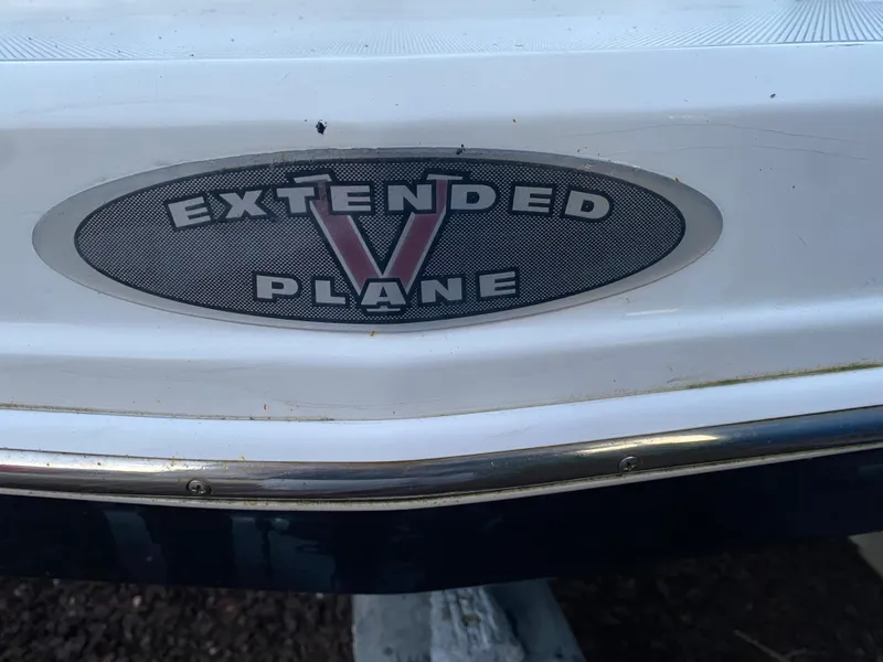 Slide: The Image of 2008 Chaparral Sunesta 244 boat with "Extended V Plane" emblem. - 14