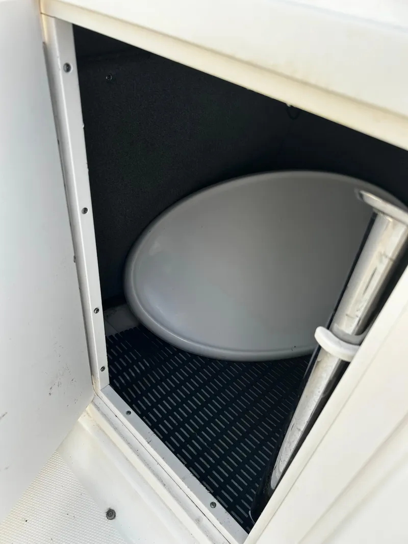 Slide: The Image of Storage compartment in a 2008 Chaparral Sunesta 244 boat. - 17