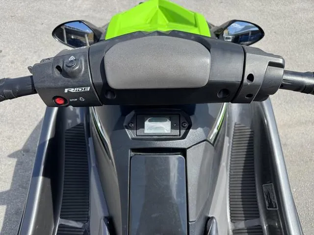 Slide: The Image of 2018 Yamaha WaveRunner EX dashboard with handlebars and control panel, featuring a green accent. - 11