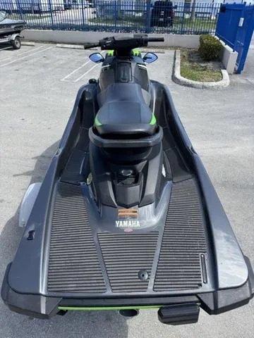 Slide: The Image of 2018 Yamaha WaveRunner EX jet ski in parking lot, rear view. - 7