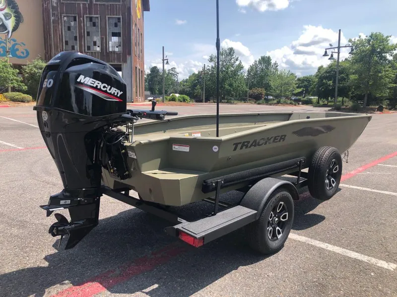 Slide: The Image of 2025 Tracker Grizzly 1650 T Prairie Wings Edition boat with Mercury engine on trailer. - 5
