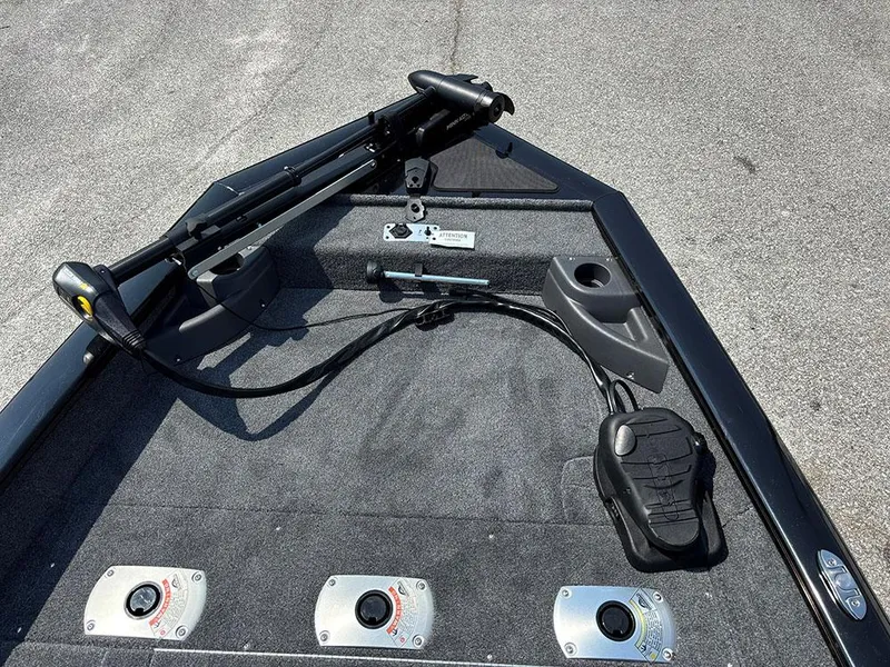 Slide: The Image of 2025 Tracker Pro Team 175 Crappie Edition boat deck with trolling motor and controls. - 10