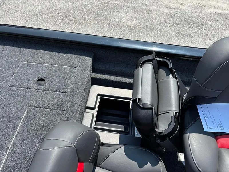 Slide: The Image of 2025 Tracker Pro Team 175 Crappie Edition boat interior with seating and storage compartments. - 16