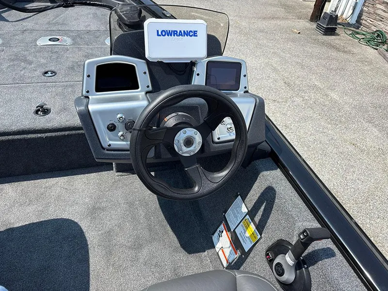 Slide: The Image of 2025 Tracker Pro Team 175 Crappie Edition boat dashboard with Lowrance electronics. - 17