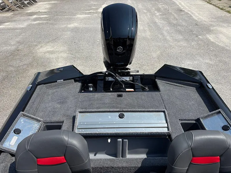 Slide: The Image of 2025 Tracker Pro Team 175 Crappie Edition boat interior with motor and seating. - 19