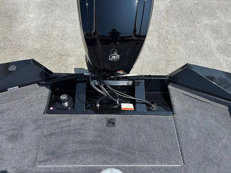 Slide: The Image of 2025 Tracker Pro Team 175 Crappie Edition boat, rear view showing motor and deck details. - 20