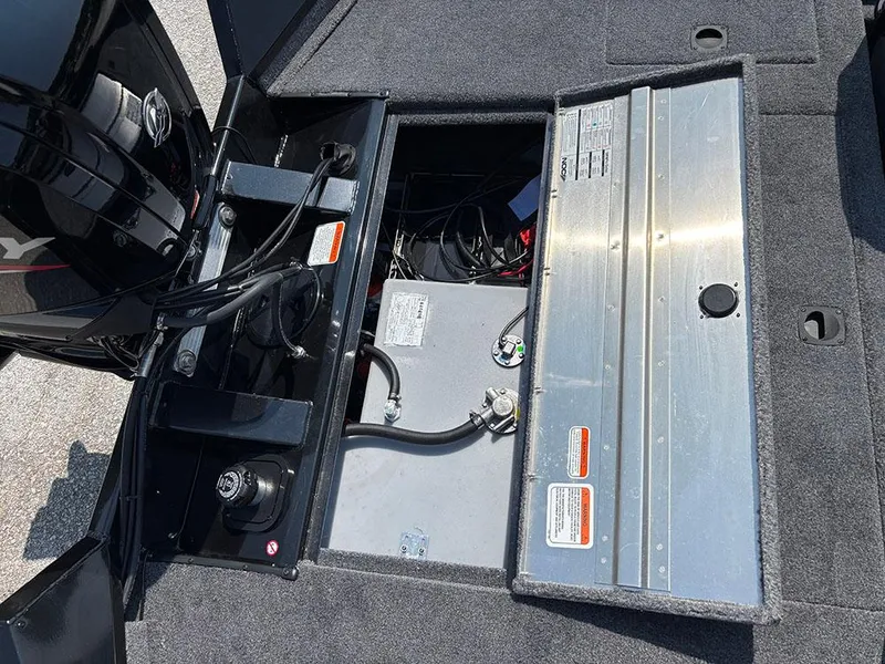 Slide: The Image of 2025 Tracker Pro Team 175 Crappie Edition boat interior showing open storage compartments. - 21