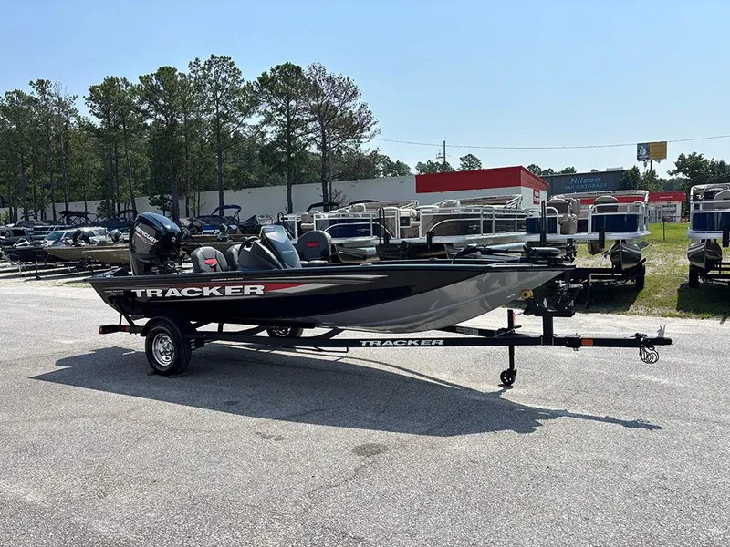 Slide: The Image of 2025 Tracker Pro Team 175 Crappie Edition boat on trailer in outdoor dealership lot. - 5