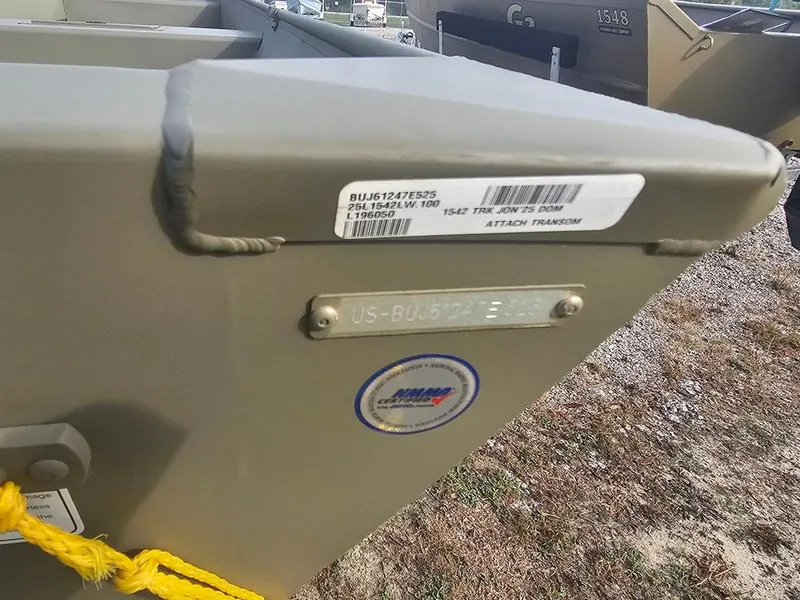 Slide: The Image of 2025 Tracker Grizzly 15 Jon boat with identification labels and yellow rope. - 10