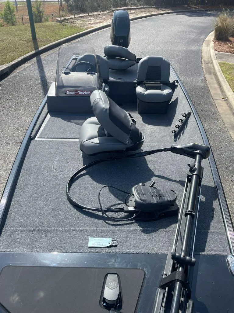 Slide: The Image of 2025 Tracker Bass Tracker Classic XL boat with seating and fishing equipment. - 3
