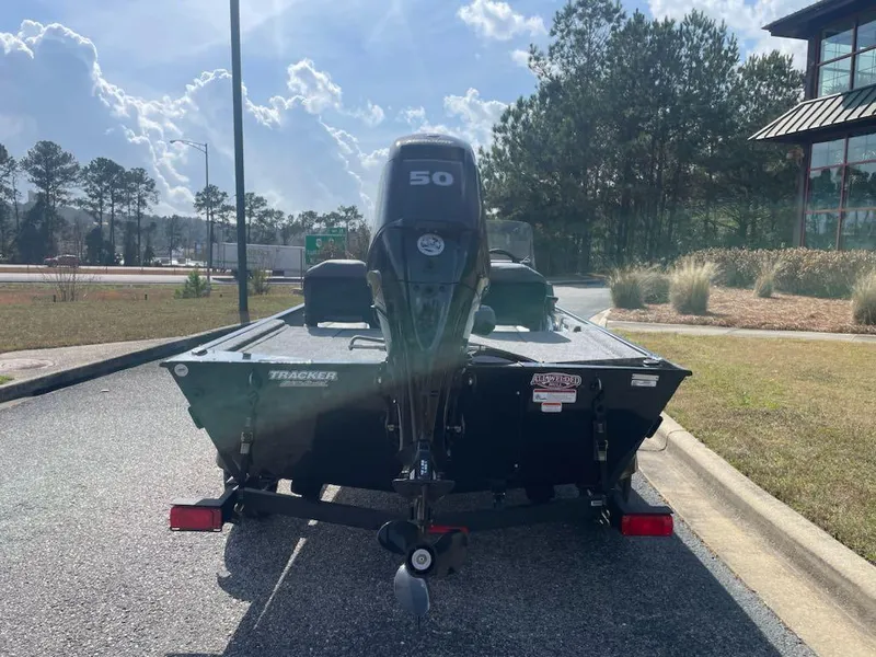 Slide: The Image of 2025 Tracker Bass Tracker Classic XL boat parked outdoors, rear view. - 4