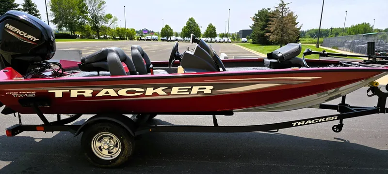 Slide: The Image of 2025 Tracker Pro Team 175 boat on trailer in parking lot. - 4