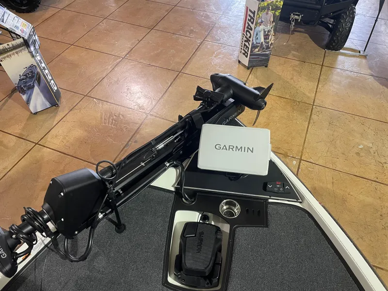 Slide: The Image of 2025 Ranger Z520 boat with Garmin navigation system on display. - 13
