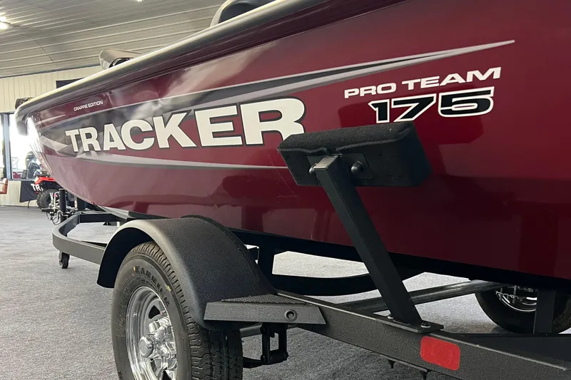Slide: The Image of 2025 Tracker Pro Team 175 Crappie Edition boat on trailer, side view. - 3