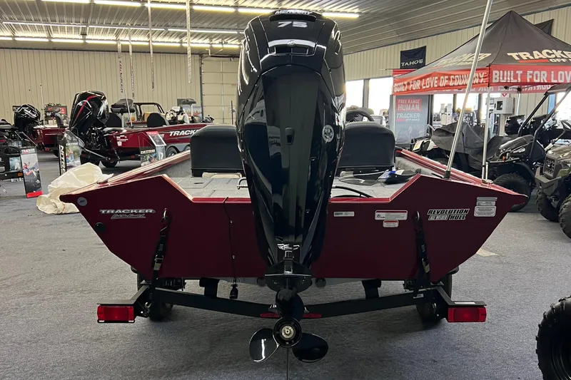 Slide: The Image of 2025 Tracker Pro Team 175 Crappie Edition boat, rear view in showroom setting. - 4