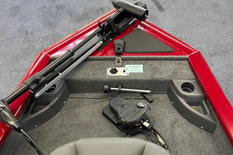 Slide: The Image of 2025 Tracker Pro Team 175 Crappie Edition boat interior with trolling motor and seating. - 6