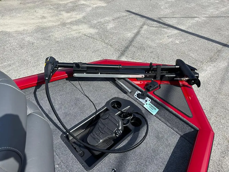 Slide: The Image of 2025 Tracker Pro Team 175 boat deck with trolling motor and foot pedal. - 12