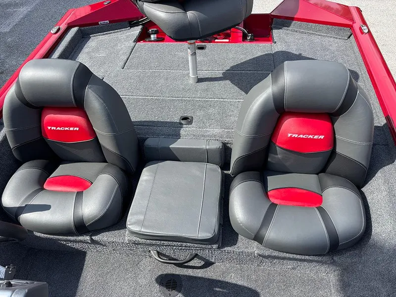 Slide: The Image of 2025 Tracker Pro Team 175 boat interior with gray and red seating. - 15