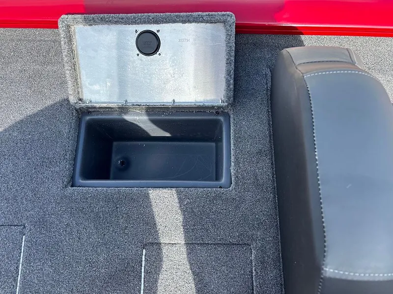 Slide: The Image of 2025 Tracker Pro Team 175 boat interior with storage compartment and seat. - 20