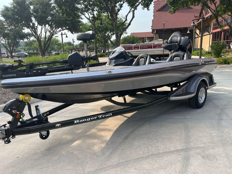 The Image of 2025 Ranger Z518 Cup-Equipped boat on trailer, parked outdoors. - 0