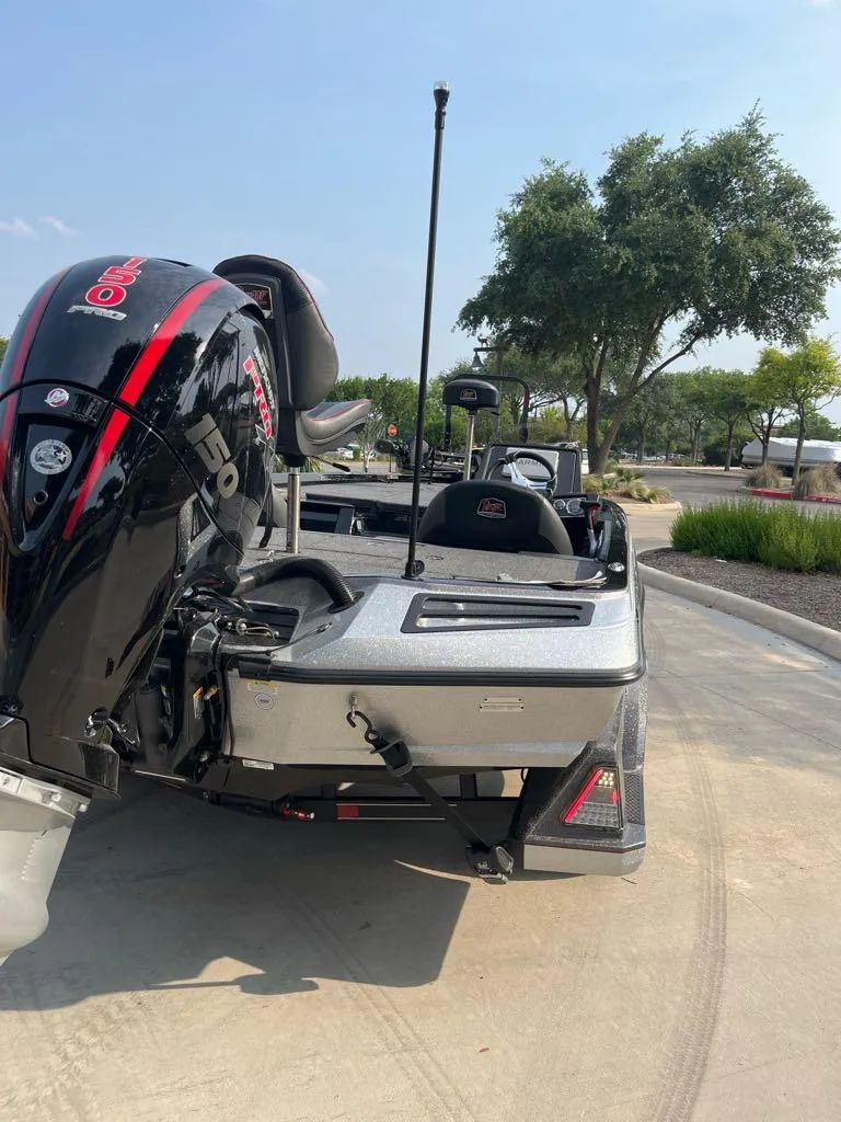 Slide: The Image of 2025 Ranger Z518 Cup-Equipped boat with powerful engine, parked outdoors. - 5