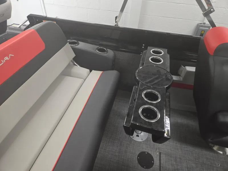 Slide: The Image of 2025 Princecraft Ventura 230 WRL boat interior with seating and cup holders. - 16