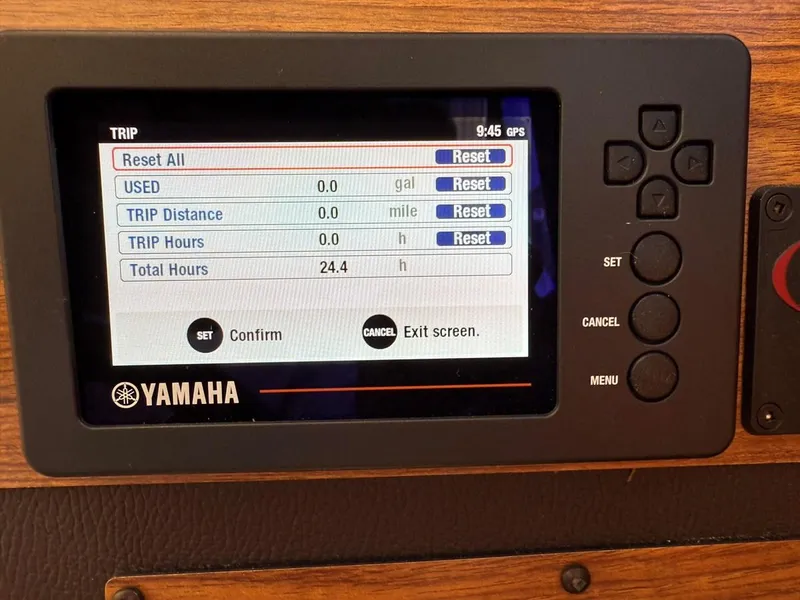 Slide: The Image of Yamaha display on 2021 Ranger Tugs R-23 showing trip settings and total hours. - 14