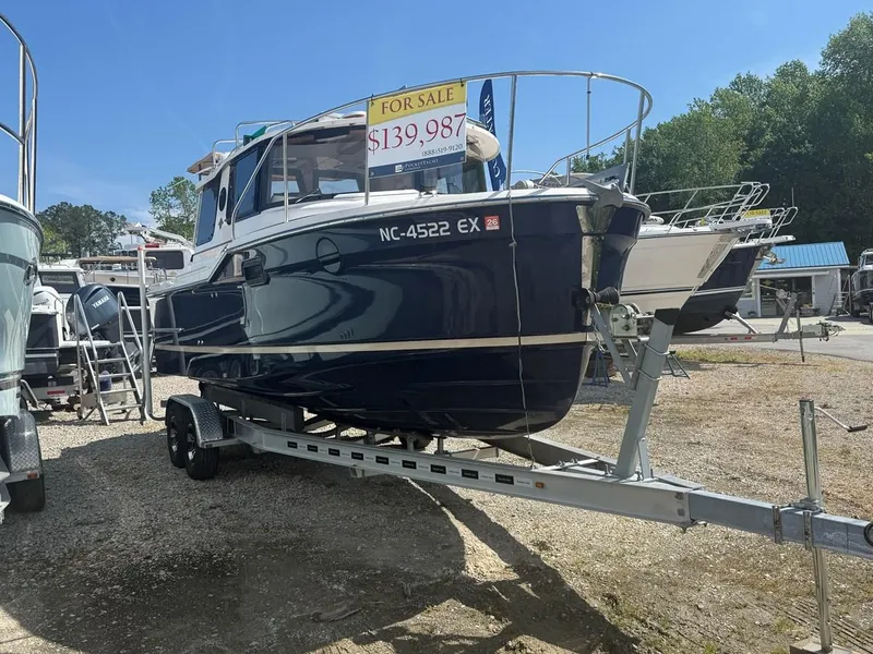 Slide: The Image of 2021 Ranger Tugs R-23 boat for sale on trailer, priced at $139,987. - 2