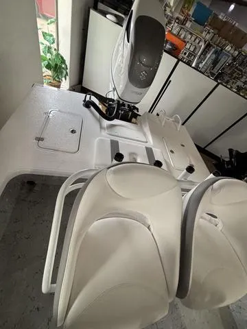 Slide: The Image of 2025 Majek 25 Xtreme boat interior with dual seats and modern console design. - 7