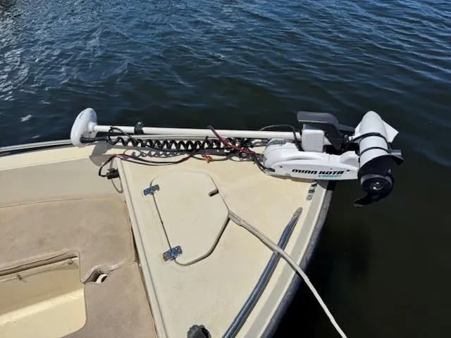 Slide: The Image of 1993 Key West 1720 DC boat with Minn Kota trolling motor on calm water. - 19