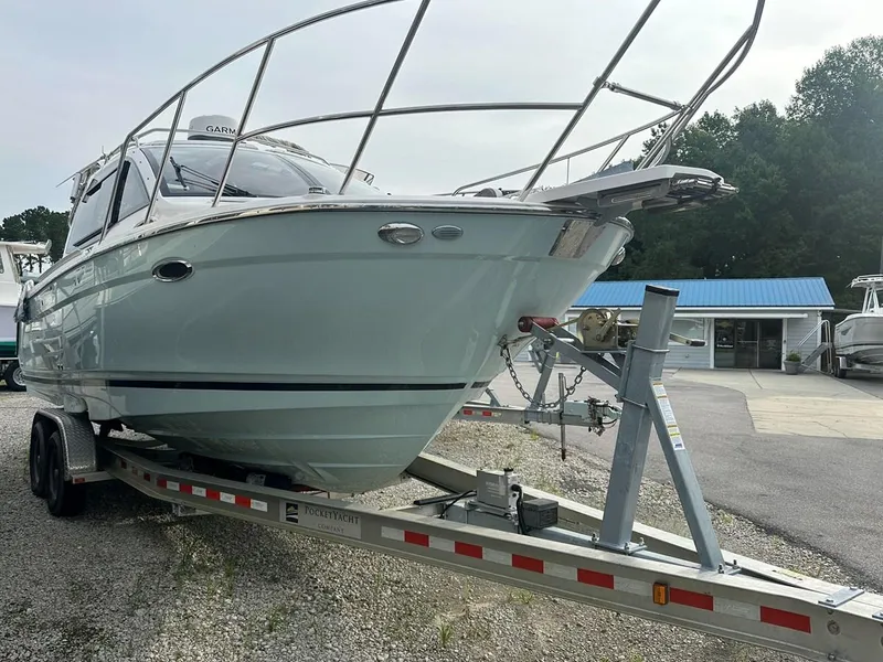 Slide: The Image of 2017 Cutwater C-24 boat on trailer, parked outdoors. - 1